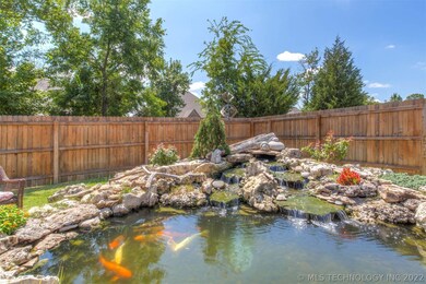 Amazing fish pond with relaxing waterfall. Beautif