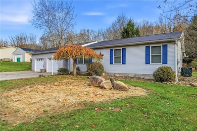2 car attached garage- perfect for storing all your lake toys!