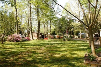 Front Yard with shed and carport.