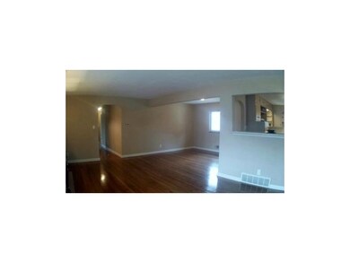 View of Dining room and breakfast bar to kitchen