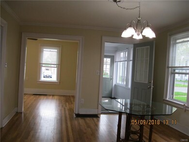 Looking form kitchen, dining room, living room and