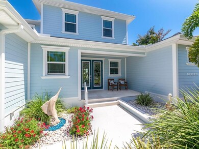 Front entry with double glass doors and inviting c