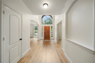 STUNNING two-story entrance with LOTS of natural sunlight!