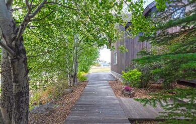 Teak Wooded Walkway to Front Door