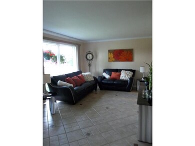 Living Room. Large front window provides natural l