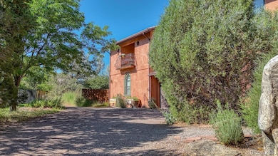 There is a two car garage and plenty of room to park a trailer or RV