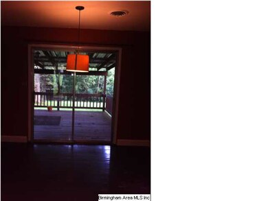 Separate dining room with updated light fixture