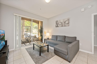 Bright and welcoming, the Living space offers abundant natural light and durable ceramic tile flooring.