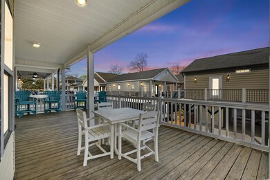 Deck at dusk with outdoor dining space