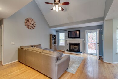 Open living room with vaulted ceilings.