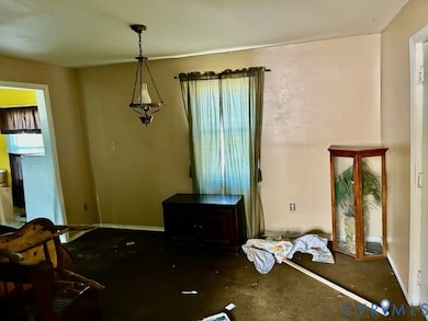 Dining space featuring baseboards