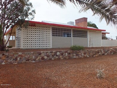 North wall of home w/entry gate on left