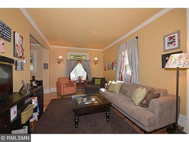 The living room is spacious and full of light.