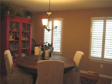 Dining Room. Gleaming hardwood floors, 3 sets of w