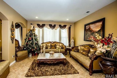 Enter into a beautiful Formal Living Room area on 