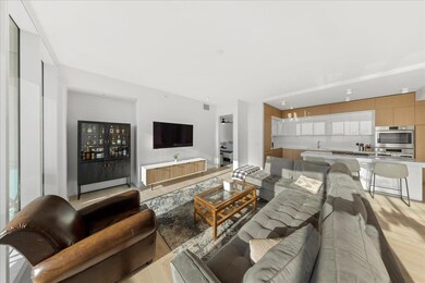 Living room featuring light wood-style floors