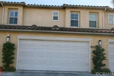 Two car attached garage enters to kitchen