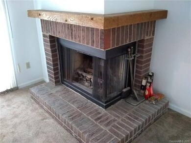 Corner Fireplace in Living Room.