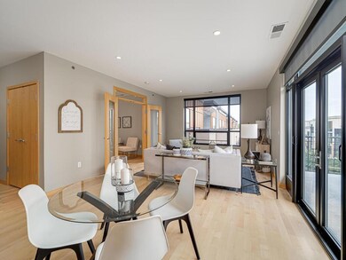 Informal dining space connects to living room.