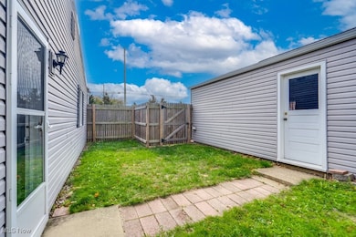 Fenced backyard with a gate