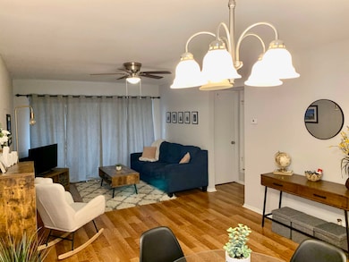 Living room featuring hardwood / wood-style floors