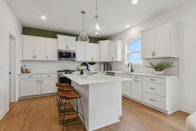 (Photos of model home, features will vary) The kitchen has ease-of-access to the mudroom and flows seamlessly into the dining room