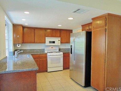 Updated kitchen with granite counter tops, includes the use of the fridge (see remarks).  