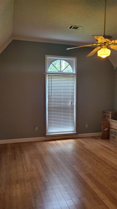 hardwood in the master bedroom