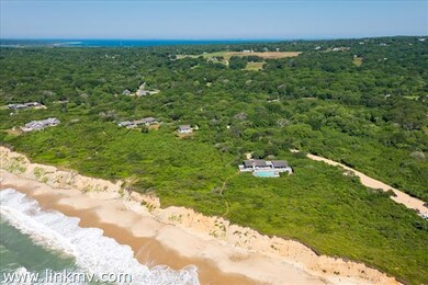 With direct access to 440 ft of private ocean beach