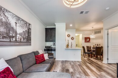 Open floor plan with a small dining bar, built-in 
