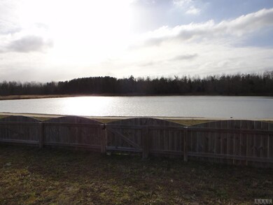 Fenced yard with Lake View