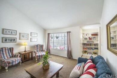 Front living room with vaulted ceiling 
