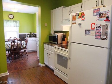 Kitchen with pantry is open to the dinette.