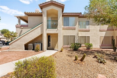 View of front of home featuring stucco siding and