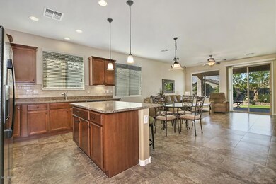 7273 W Cinder Brook Way-large-007-019-Ki