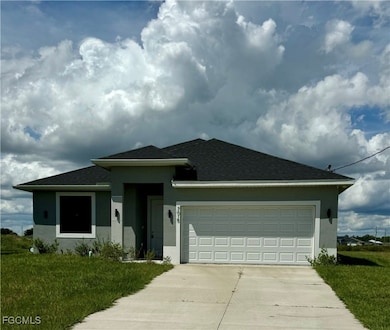 View of front of home with stucco siding, roof with shingles, an attached garage, concrete driveway, and a front yard