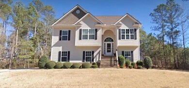 View of front of house with a front yard