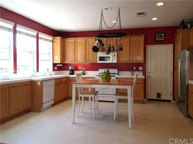 White Tile Counters, Decorative Wrought Iron Rack,