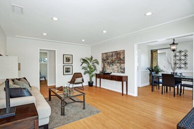 Spacious Living Room with picture window looking t