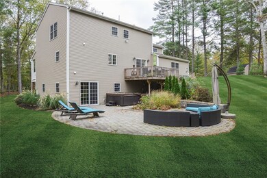 Exterior Back with Deck, Circular Patio, Hot Tub a