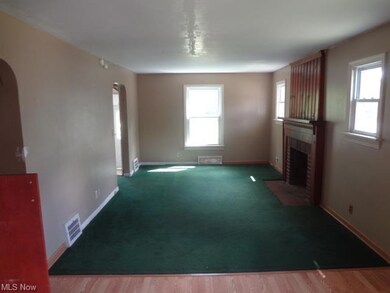 Living room with decorative fireplace