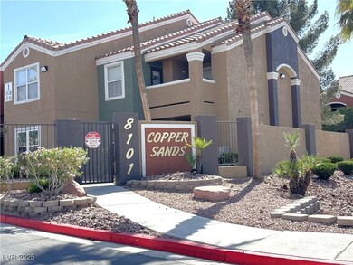 View of front of home with stucco siding, a gate,