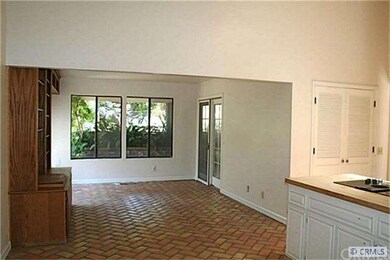 Family Room adjoining Kitchen, and sliding door to