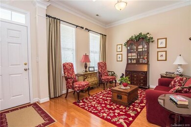 Sitting room on your right as you enter the home