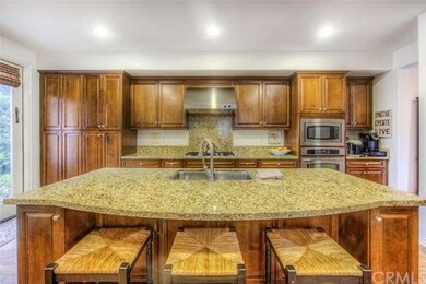 A closer view of the kitchen and granite island - 