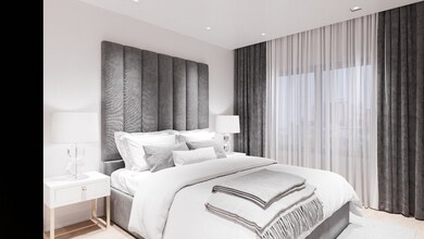 Retreat to the luxurious primary bedroom, a serene