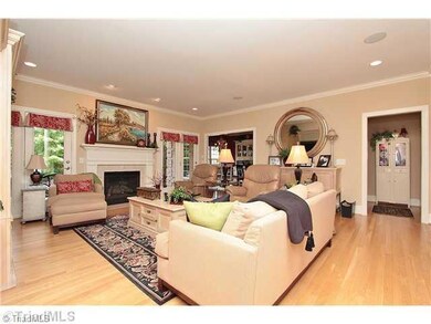 Den/Family/Great Room. Double doors open to covered porch and patio.
