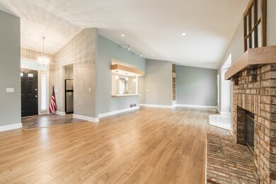 Looking back to the Foyer Entry and the Kitchen