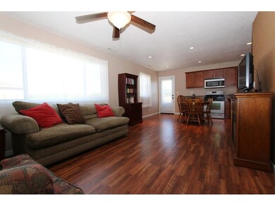 Laminate Flooring from Living Room to Kitchen