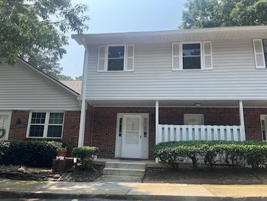 View of front of home featuring brick siding